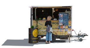 woman buying food from a food truck