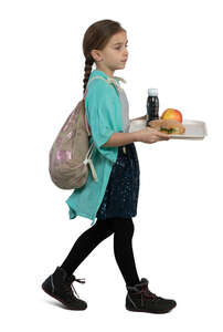 little girl with a tray walking in school cafeteria