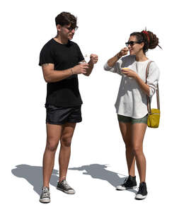 man and woman standing and eating ice cream outside