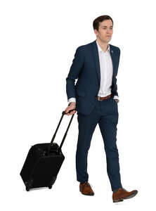 travelling businessman with a suitcase walking