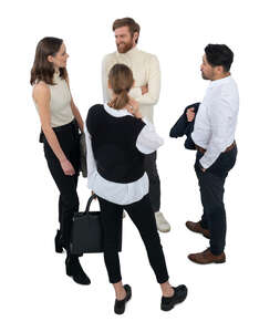 group of four people standing and talking