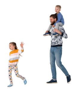 man with two kids walking happily