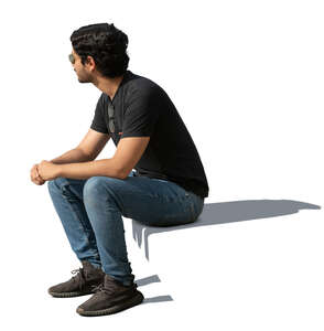 dark haired man sitting