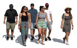group of seven people walking in summer