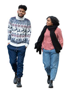 man and woman walking on a chilly day