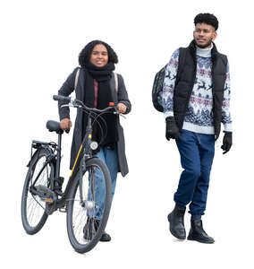 man and woman with a bike walking in autumn