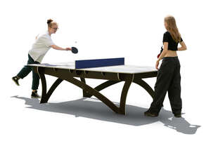 two backlit women playing ping pong outside