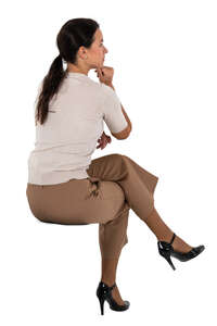 woman sitting and leaning on a table