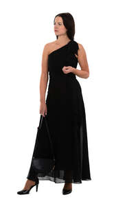 woman in a long black party dress standing