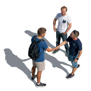 group of men standing seen from above and greeting each other
