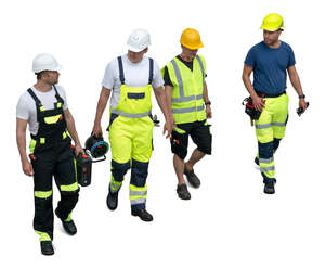 four workmen walking seen from above