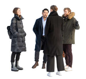 group of people in overcoats standing and talking