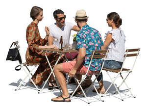 four people sitting in a an outdoor restaurant