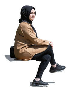 muslim woman with hijab sitting