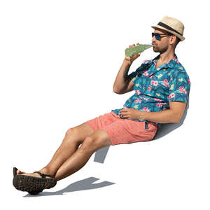 man sitting and relaxing and drinking soda