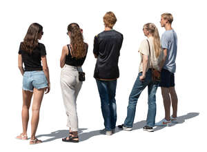 group of people standing outside and looking at things