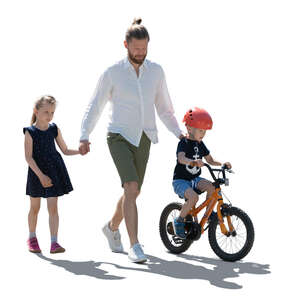 backlit man with two kids walking