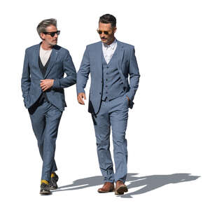 two men in suits walking