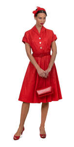 woman in a vintage red dress standing