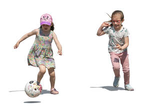 two little girls playing football