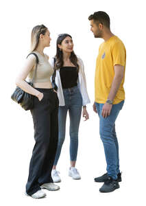 group of three people standing
