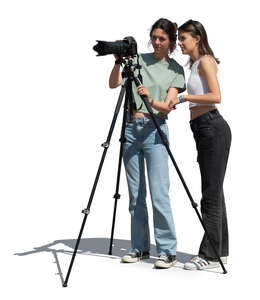 two women with a photo camera taking pictures