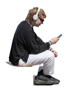 man with headphones sitting