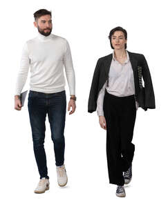man and woman in black and white outfits walking