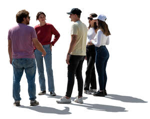 backlit group of friends standing