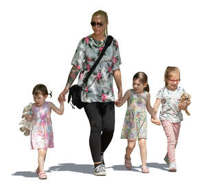 woman with three girls walking hand in hand in tree shade