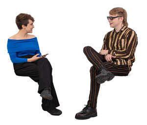 woman and a man sitting and talking