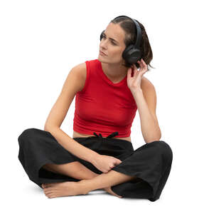 woman with headphones sitting