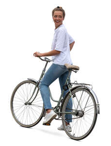 woman with a bike standing and looking back over her shoulder