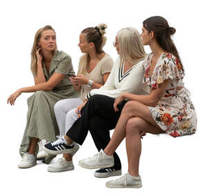 group of women sitting and talking