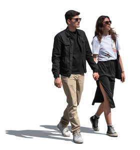 dark haired couple walking hand in hand