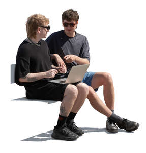 two young men with laptop sitting and talking