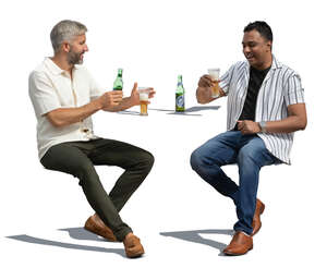 two men sitting happily in a cafe and drinking beer