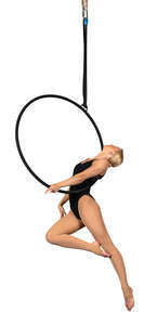 acrobat performing on an aerial hoop