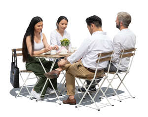 group of people sitting in a restaurant