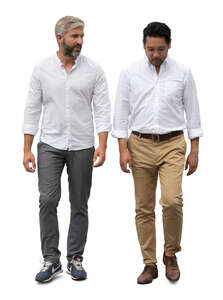 two men in white shirts walking