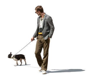 man walking a dog