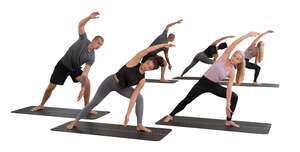 three people doing yoga exercises in front of the mirror