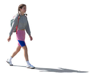 woman in biker shorts walking