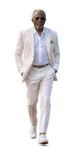 older black man in a white suit walking