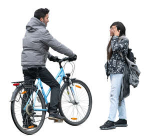 man with a bike talking to his girlfriend