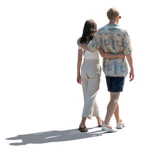 backlit couple in summer walking