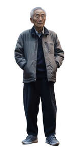old asian man in a brown jacket standing