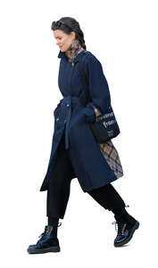 woman with a dark blue overcoat walking