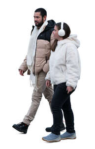 cut out man and woman in winter walking together