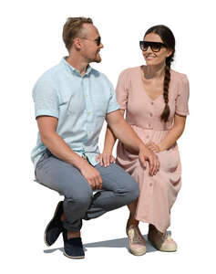 couple sitting and smiling at each other